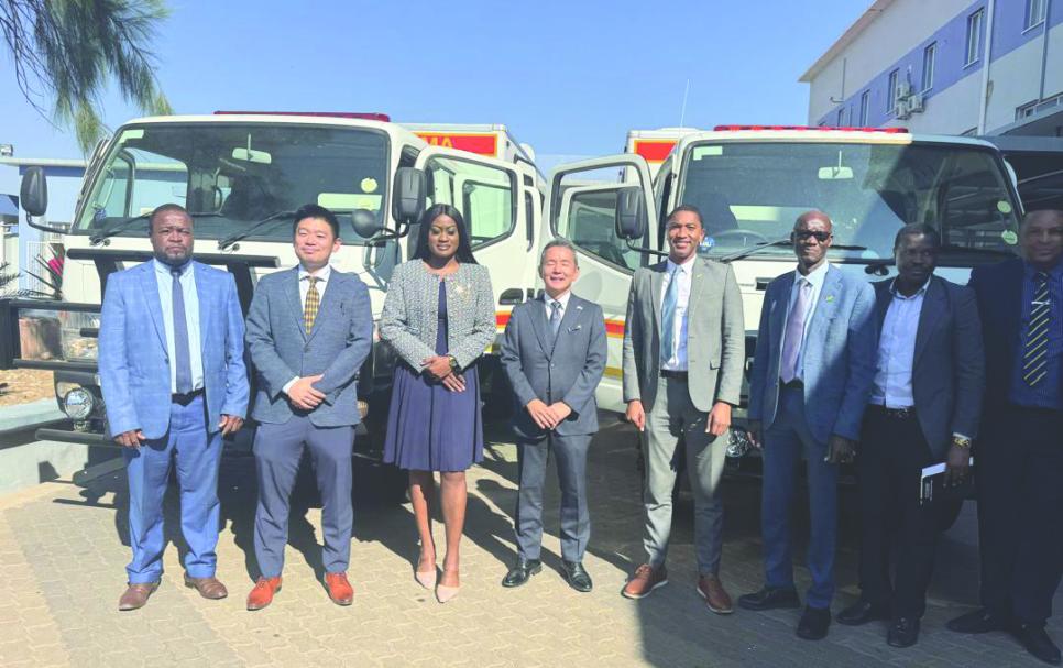 Health Minister Dr. Esperance Luvindao receiving donation from the Japanese government