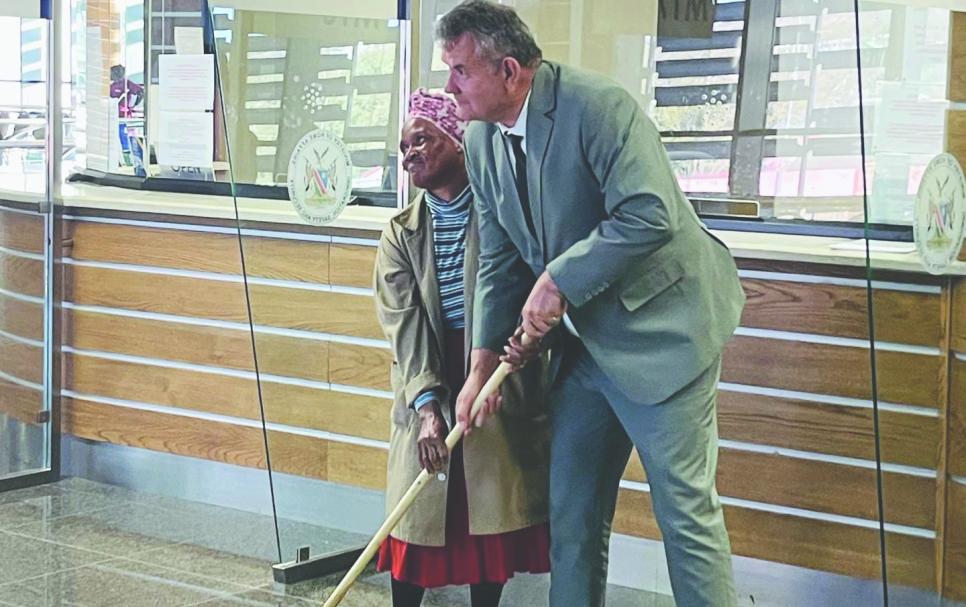 Mr Etienne Maritz and cleaner